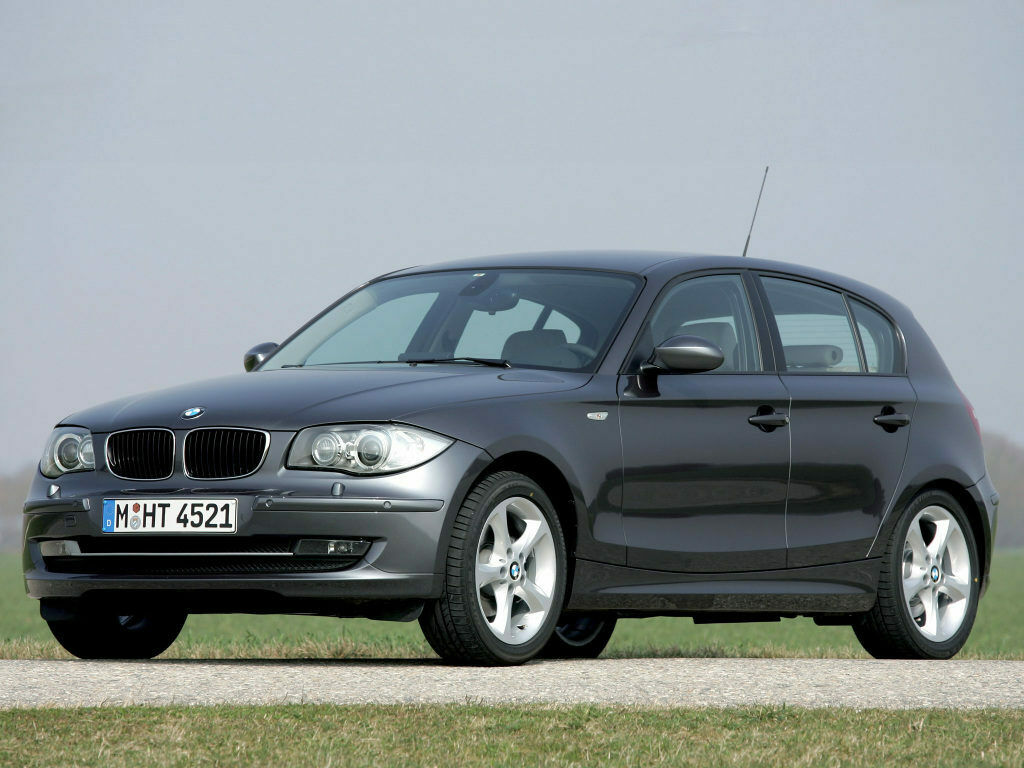 PARAURTI BMW SERIE 1 E81 E87 ANTERIORE CON LAVAFARI VERNICIABILE DAL 2007 A 2011